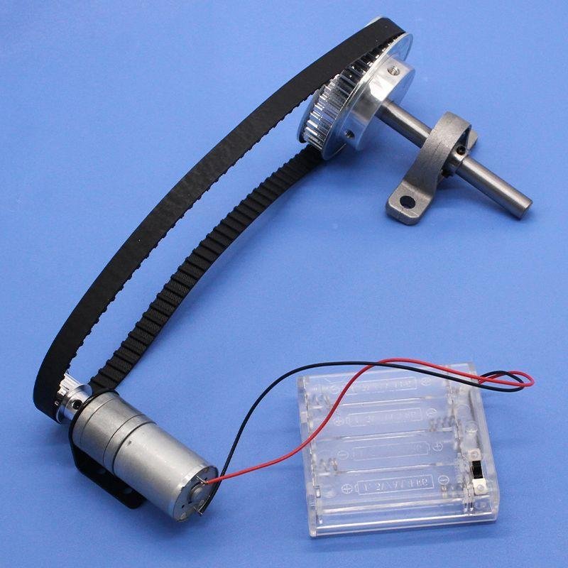 Motor, toothed belt and pulley assembly used in moving head positioning