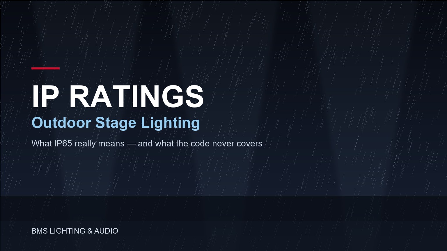 Outdoor stage lighting fixtures exposed to heavy rain and wind on an open-air festival stage