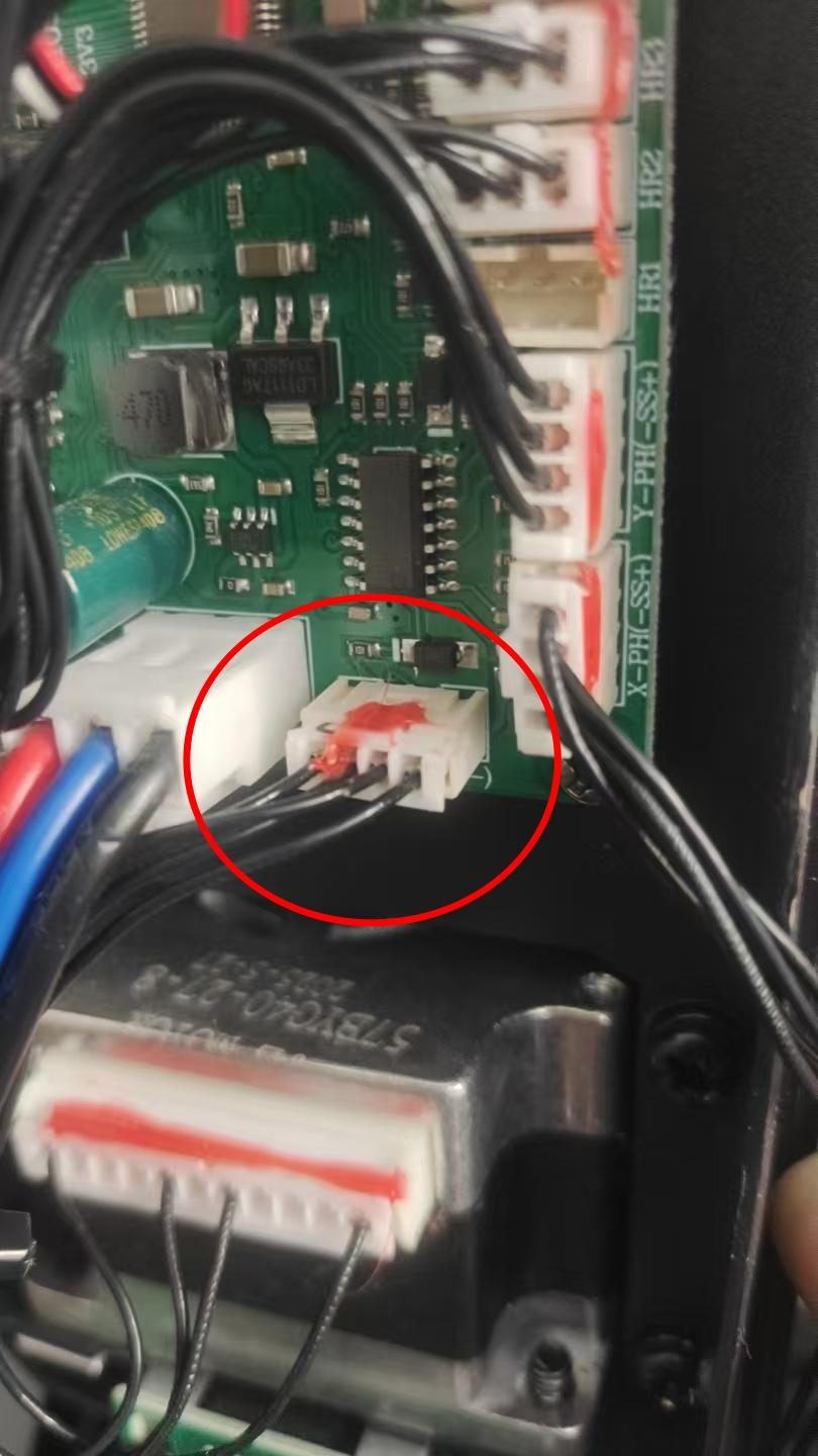 Red circle marking the communication cable between mainboard and display board