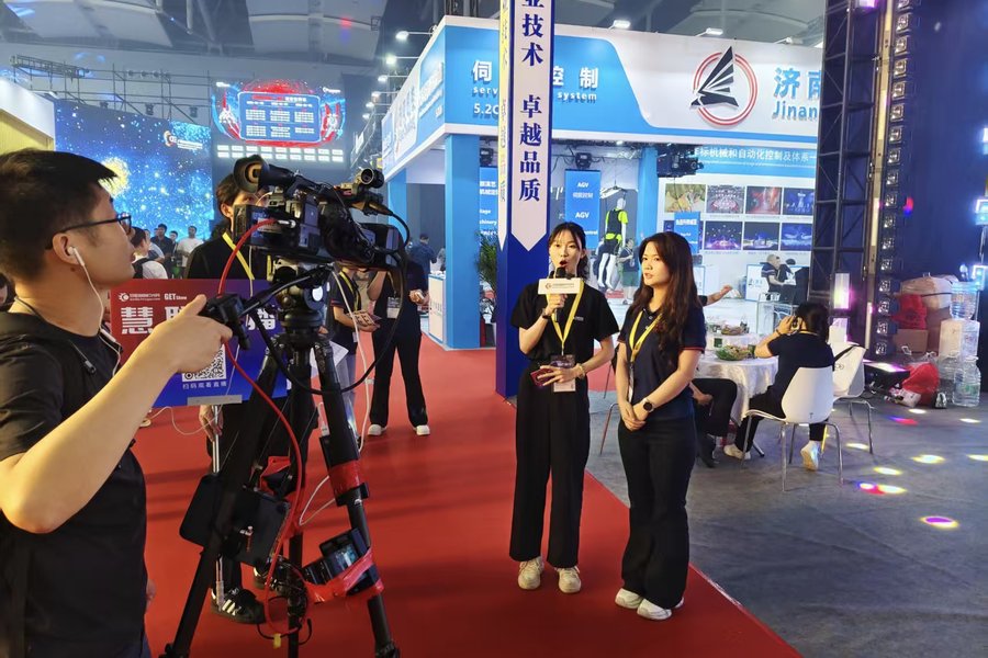 Filming on the exhibition floor during the 2026 show week
