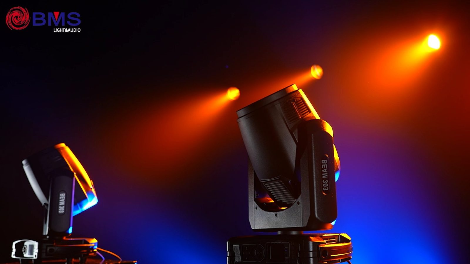 Two BEAM 303 moving head lights cutting through the dark